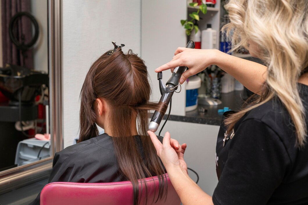 hairdresser-taking-care-client-s-hair-salon_23-2148940873